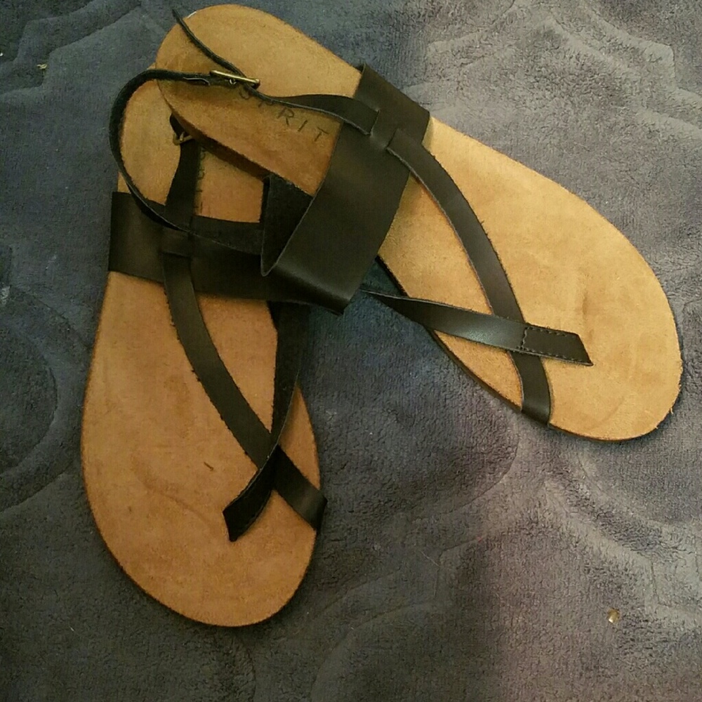 Black, flat, casual sandals.